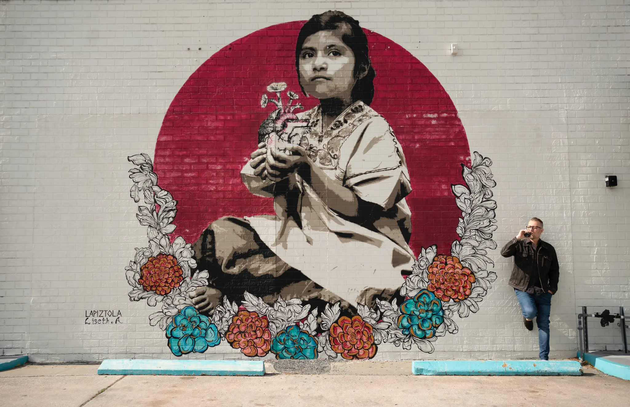 Jason Clark by street mural